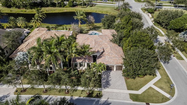 drone / aerial view with a water view