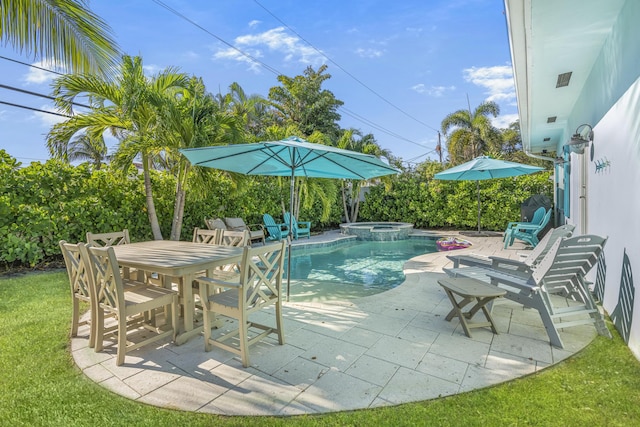 view of swimming pool featuring an in ground hot tub and a patio