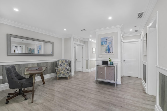 office space featuring light hardwood / wood-style floors and ornamental molding