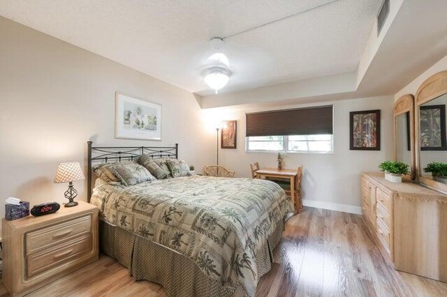 bedroom featuring light wood-type flooring