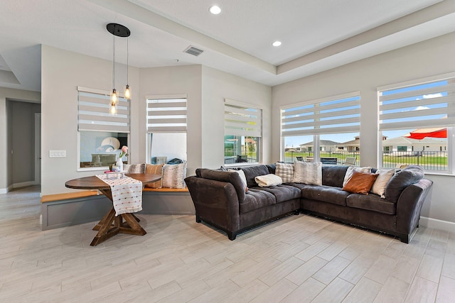 living room with light hardwood / wood-style flooring