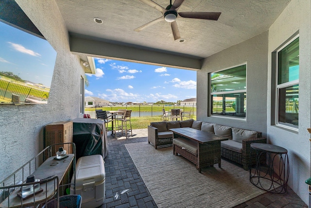 view of patio / terrace with an outdoor hangout area and ceiling fan