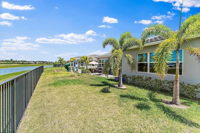 view of yard with a water view