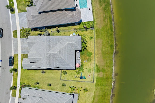 drone / aerial view featuring a water view