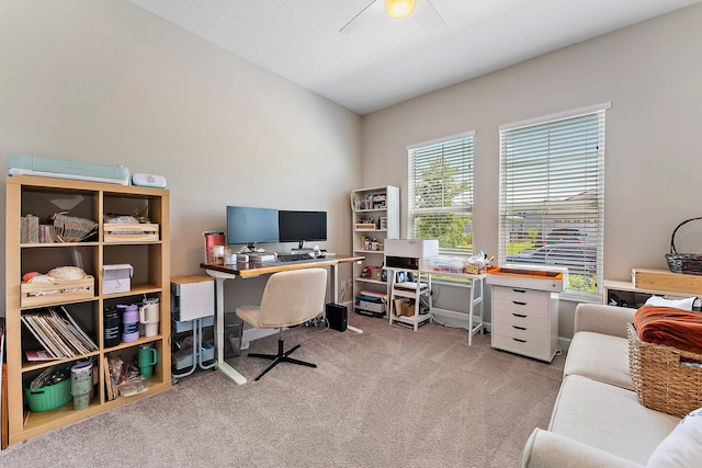 carpeted office with ceiling fan