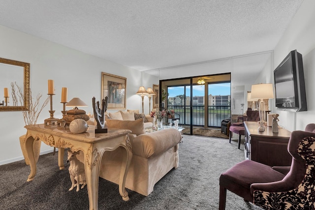 carpeted living room with a textured ceiling and ceiling fan