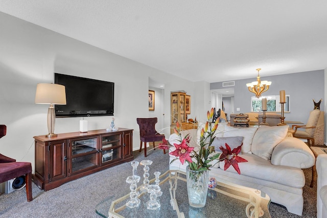 living room featuring a chandelier and light carpet