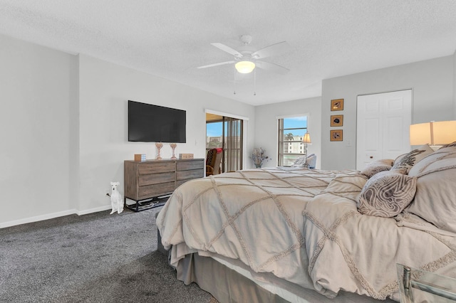 bedroom featuring carpet flooring, ceiling fan, a closet, and a textured ceiling