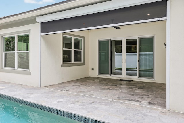 exterior space with a patio area and french doors