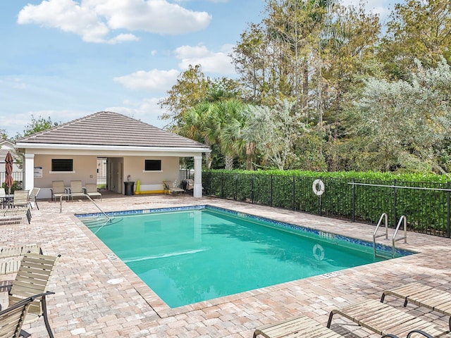 view of pool featuring a patio