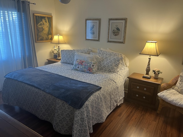 bedroom featuring dark hardwood / wood-style floors