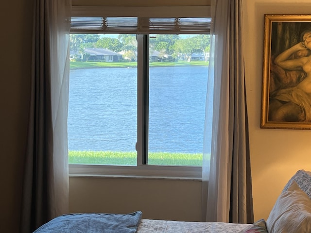 bedroom with a water view