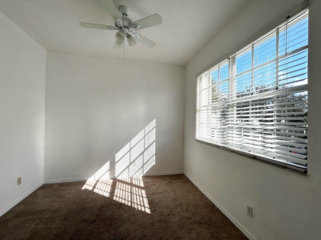 unfurnished room with carpet and ceiling fan