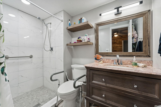 312 Lake Dora Dr, West Palm Beach, FL 33411 - bathroom with vanity, a stall shower, and toilet