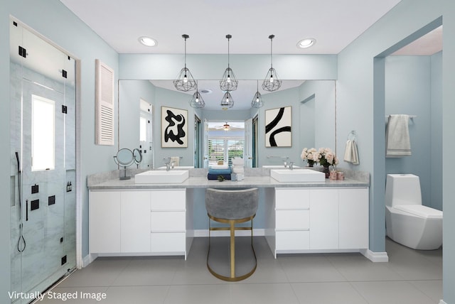 bathroom featuring ceiling fan, tile patterned flooring, vanity, and a shower with shower door