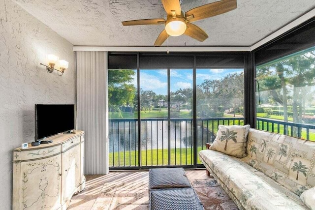 sunroom / solarium with ceiling fan