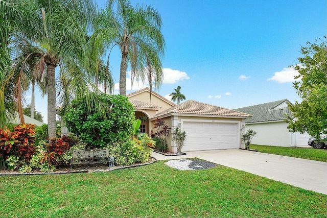 1643 Oak Berry Cir, Wellington, FL 33414 - mediterranean / spanish house with an attached garage, a tiled roof, concrete driveway, stucco siding, and a front lawn