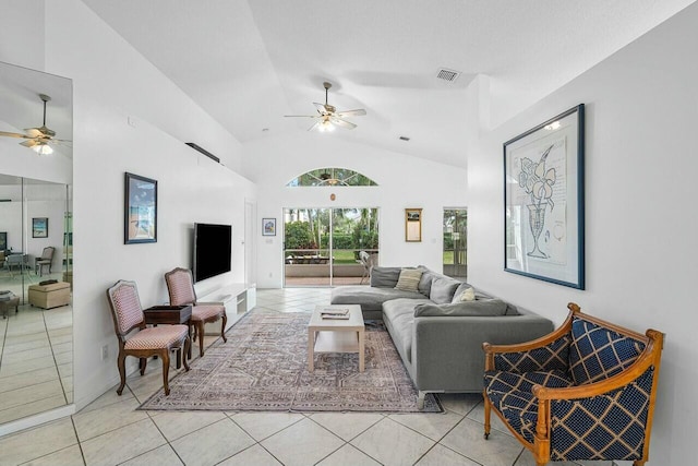 1643 Oak Berry Cir, Wellington, FL 33414 - living area with ceiling fan, light tile patterned floors, and high vaulted ceiling