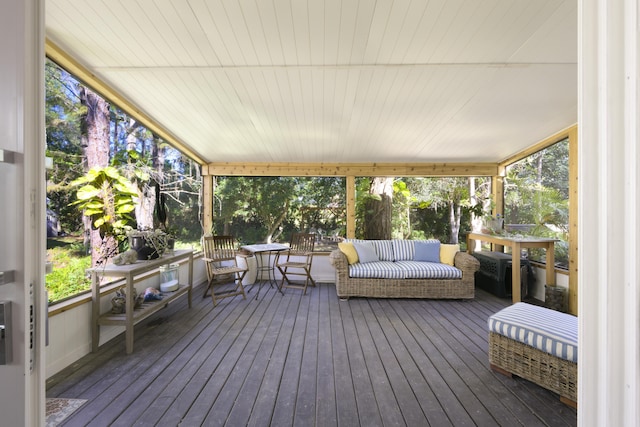 unfurnished sunroom featuring plenty of natural light