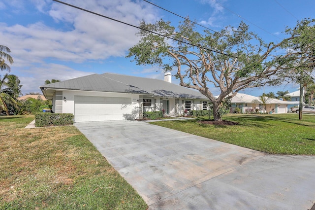 ranch-style house with a front lawn and a garage