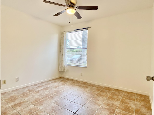 6928 Briarlake Cir Unit 104, Palm Beach Gardens, FL 33418 - unfurnished room featuring ceiling fan, light tile patterned floors, and baseboards