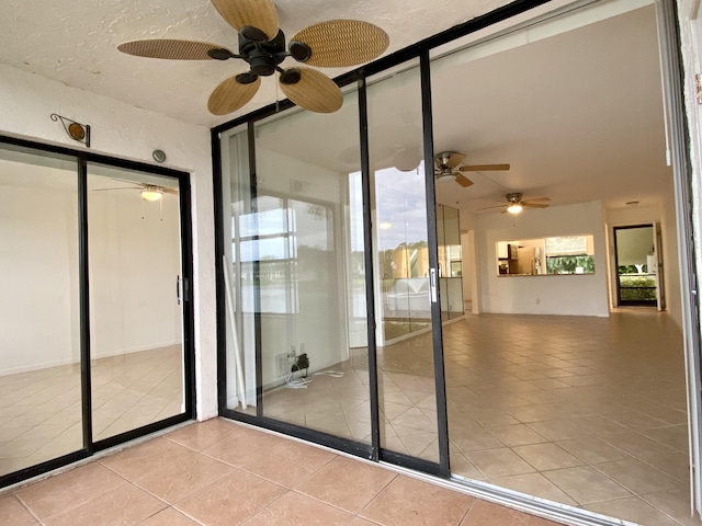 6928 Briarlake Cir Unit 104, Palm Beach Gardens, FL 33418 - unfurnished sunroom with ceiling fan