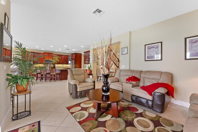 bedroom featuring a tray ceiling, ceiling fan, and dark hardwood / wood-style flooring