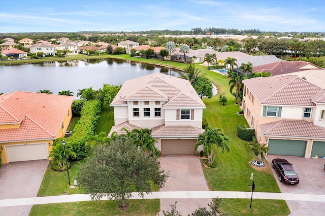 birds eye view of property featuring a water view