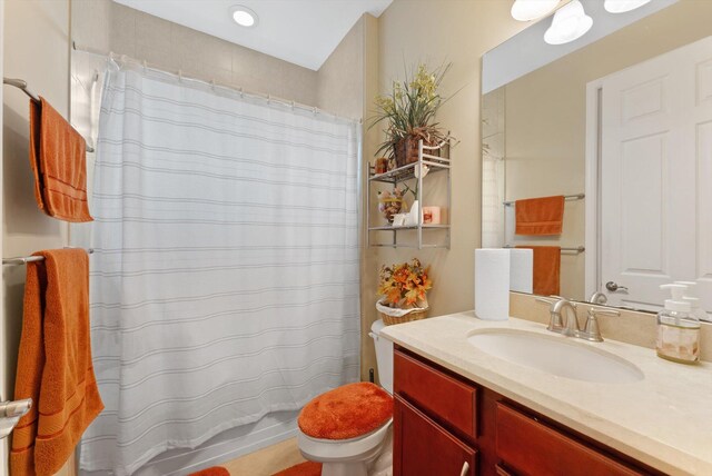 bathroom with shower / bath combination with curtain and toilet