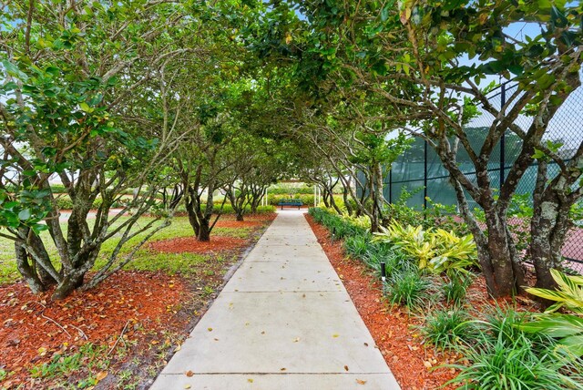 view of community featuring a yard and volleyball court