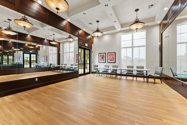 gym featuring a high ceiling