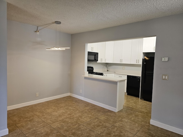 kitchen with black appliances, kitchen peninsula, a textured ceiling, decorative light fixtures, and white cabinetry