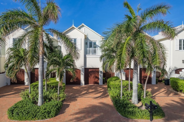 view of front of property with a balcony