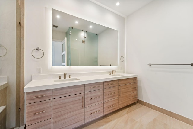 bathroom with vanity and walk in shower