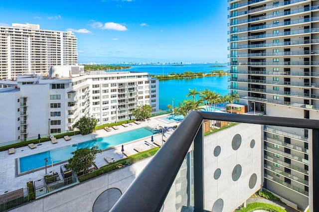 balcony featuring a water view