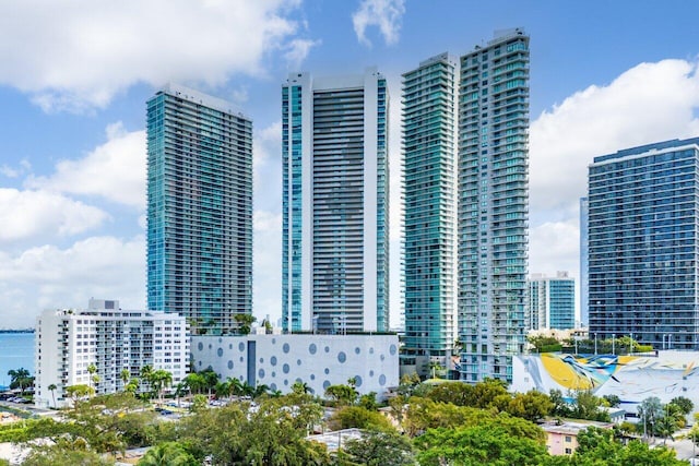 view of building exterior with a water view