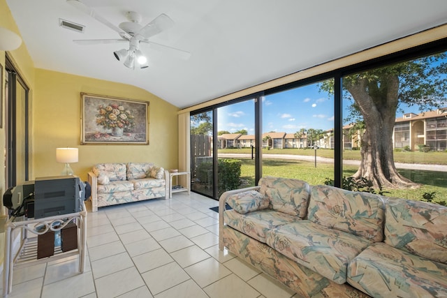 sunroom with lofted ceiling and ceiling fan