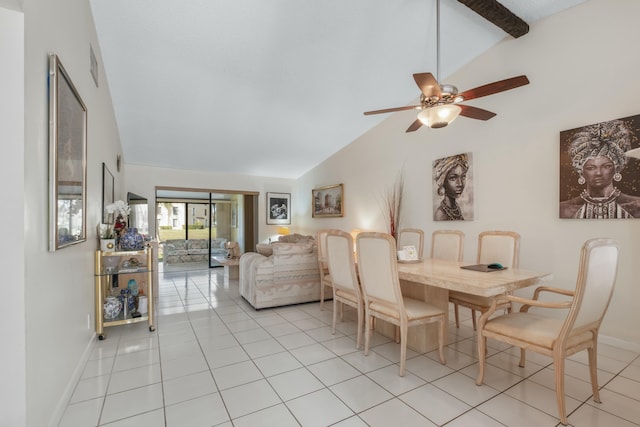 tiled dining room featuring lofted ceiling with beams and ceiling fan