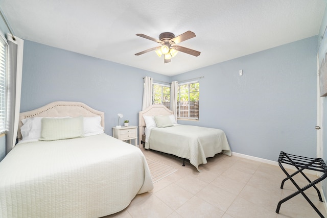 bedroom featuring ceiling fan