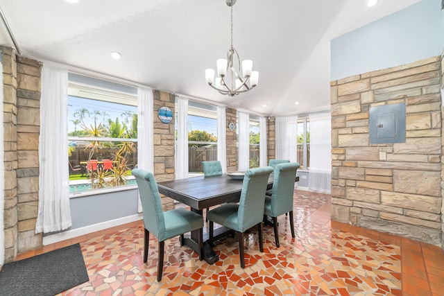 tiled dining area with a textured ceiling, electric panel, and an inviting chandelier