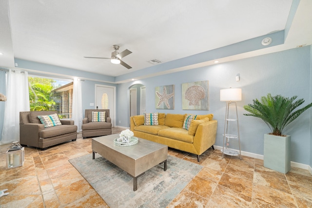 living room with ceiling fan