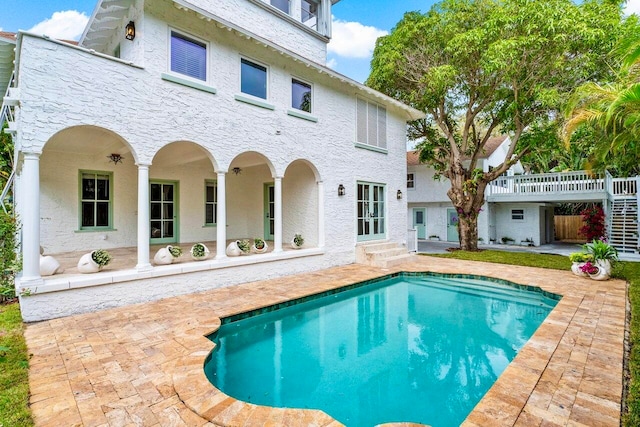 back of house with a patio area