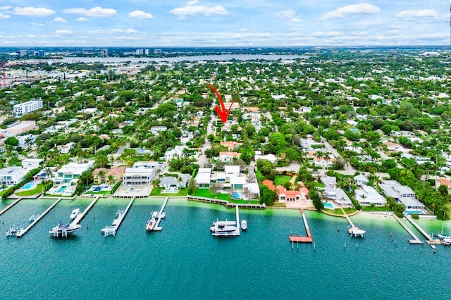 birds eye view of property featuring a water view