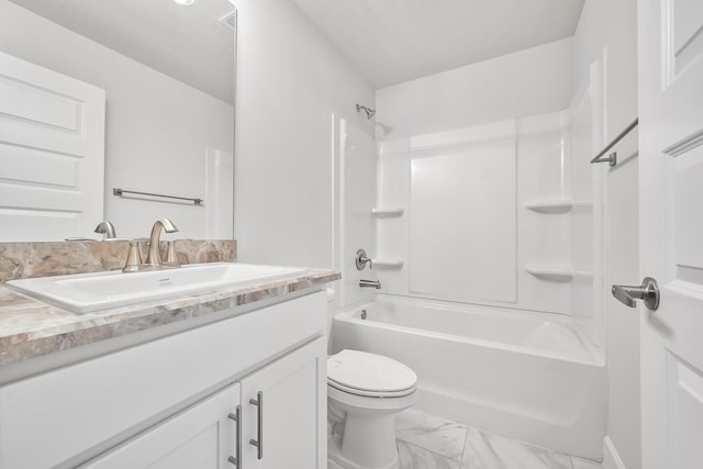 full bathroom with shower / washtub combination, vanity, and toilet