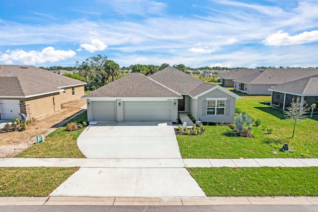 single story home with a front lawn and a garage