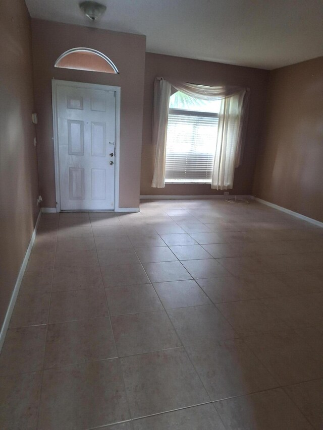 entryway with tile patterned flooring