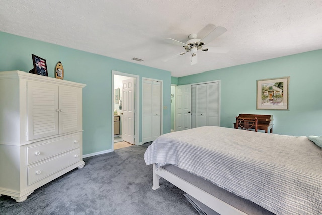 bedroom with ensuite bath, ceiling fan, light colored carpet, and a textured ceiling