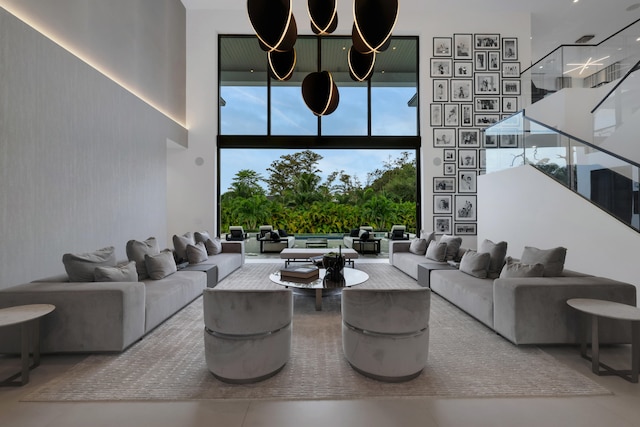 living room with a high ceiling