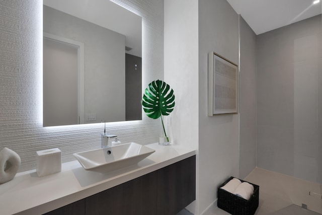 bathroom with backsplash and vanity