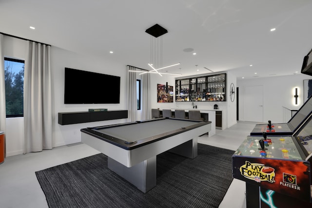 playroom featuring bar and billiards